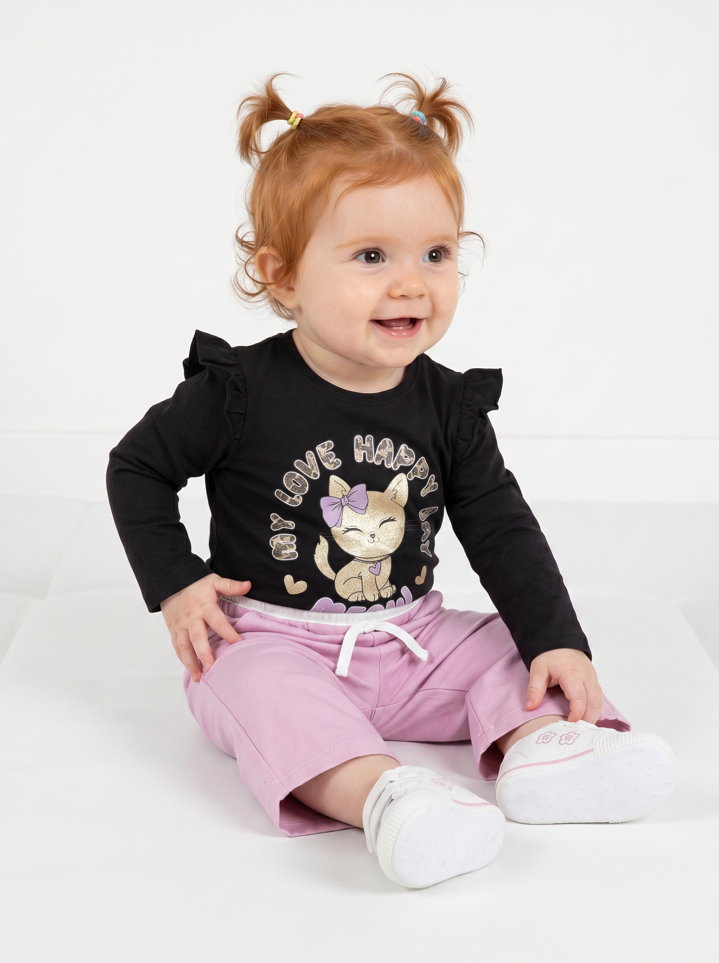 T-shirt a manica lunga con volant e stampa - Nero