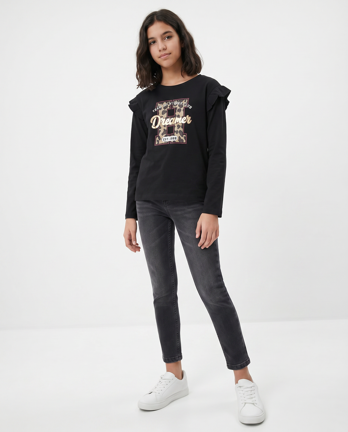 T-shirt lunga con rouches e stampa vivace - Nero