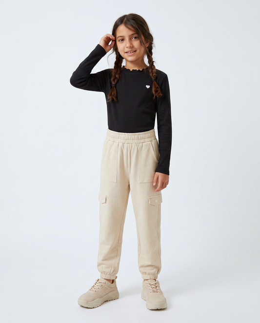 Comfortable girls' joggers with pockets and elastic waistband - Beige