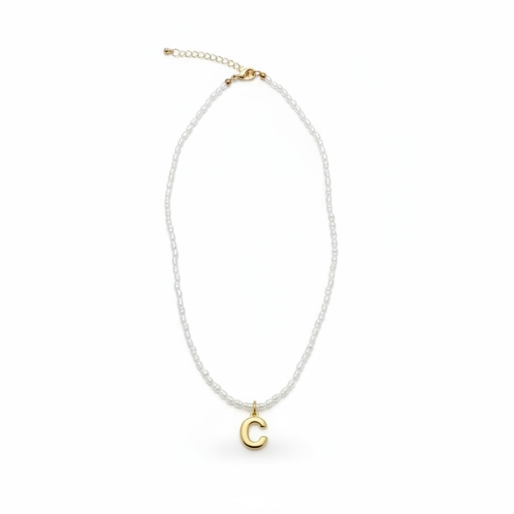 Beaded necklace with metal letter - 
