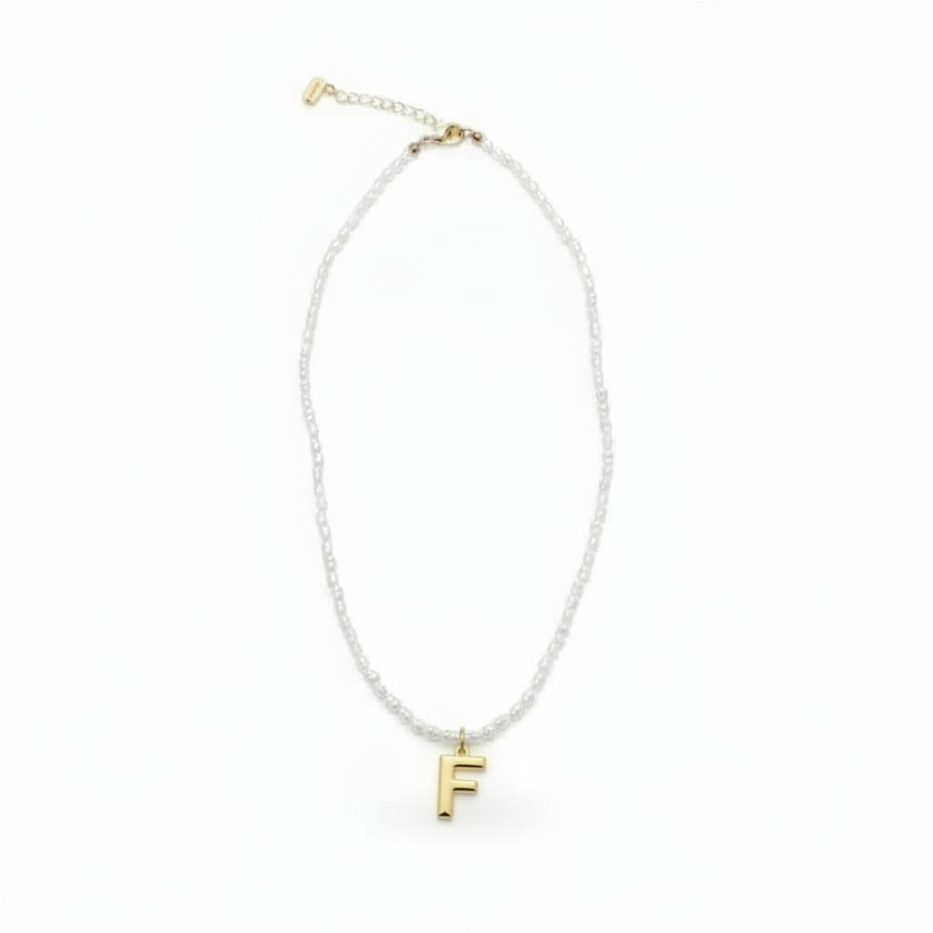 Beaded necklace with metal letter - 