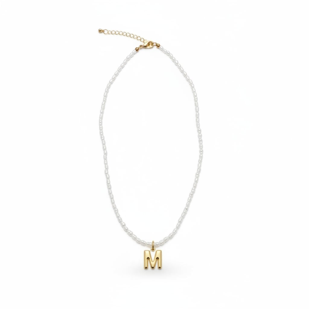 Beaded necklace with metal letter - 