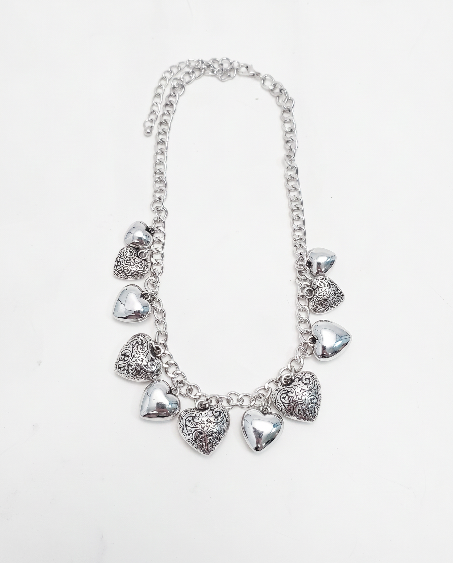 Collana con cuori intarsiati e lisci - Argento