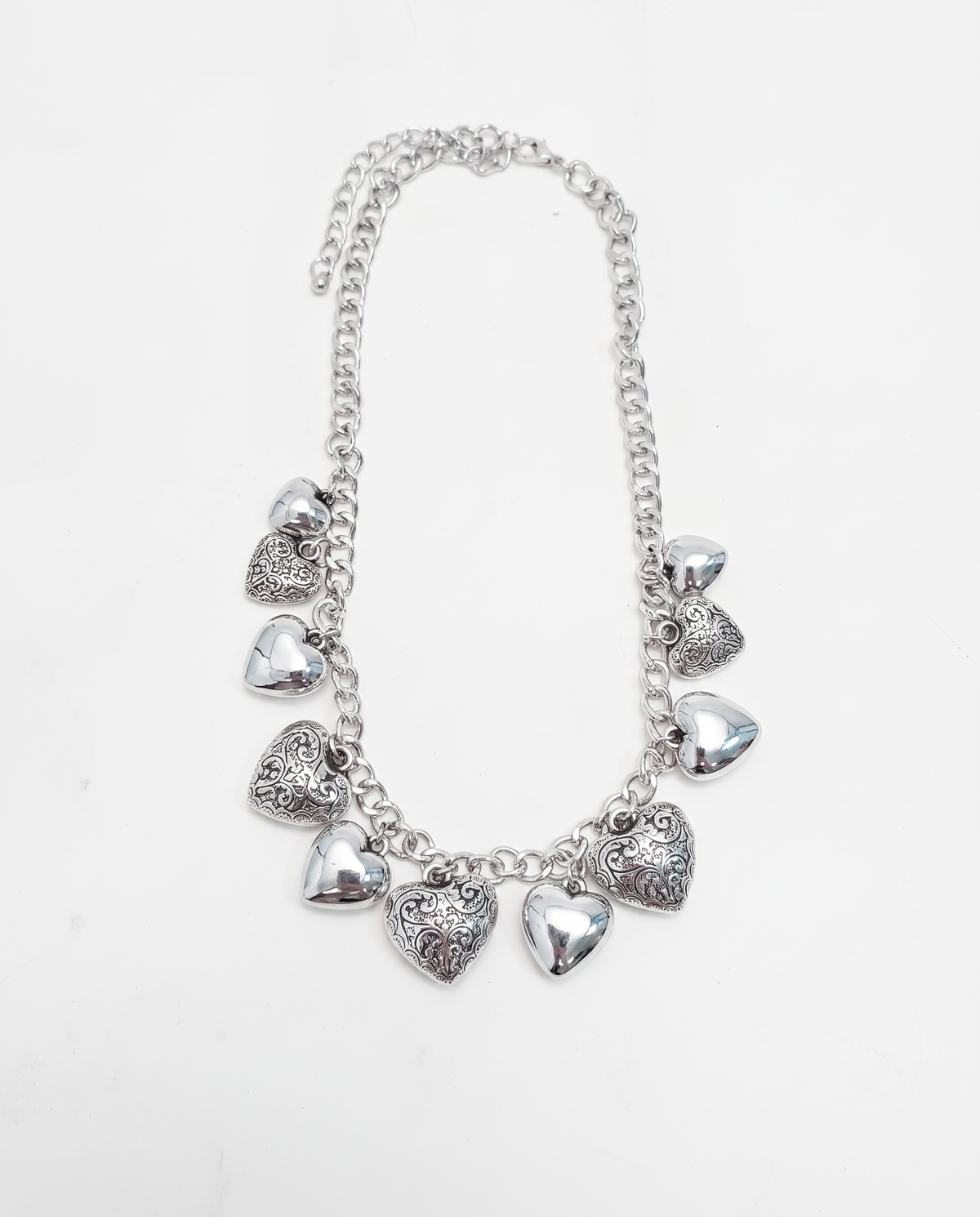 Necklace with inlaid and smooth hearts - Silver