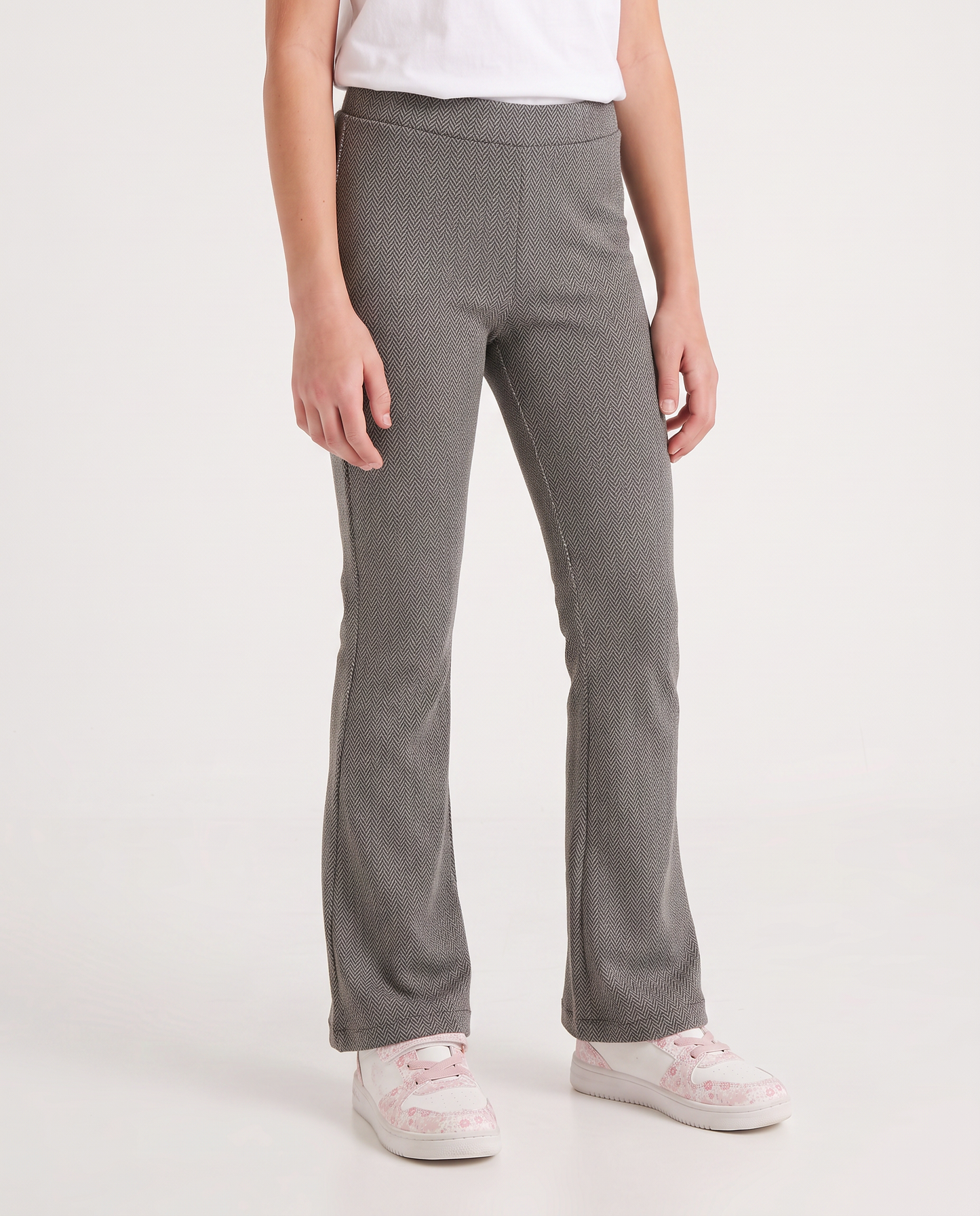Pantaloni flare in tessuto spigato elastico - Beige