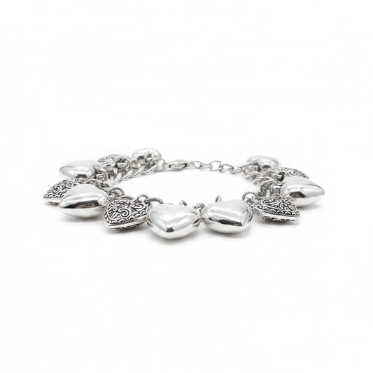 Bracciale di cuori lisci e intarsiati - Argento