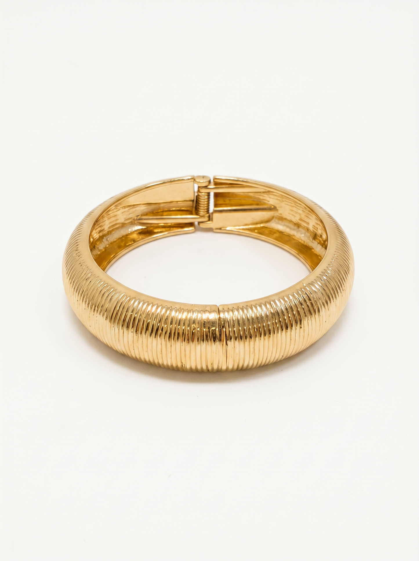 Bracciale rigido con striature eleganti - Oro
