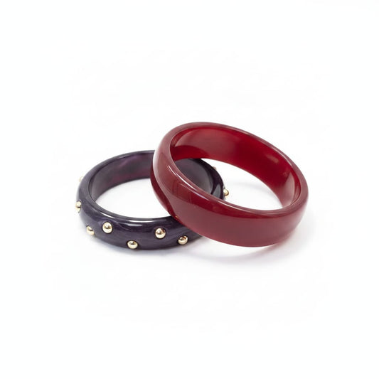 Bracciali rigidi in plastica con borchie - Rosso