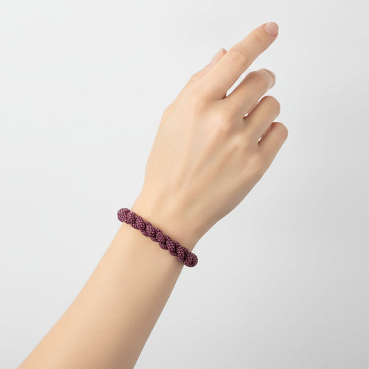 Bracciale tubolare con strass intrecciati - Rosa