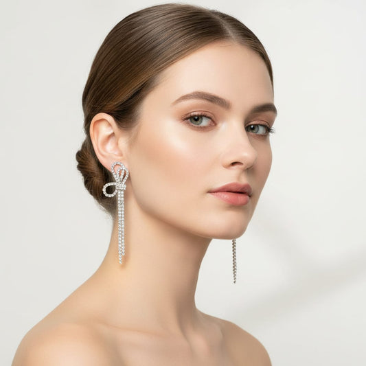 Orecchini pendenti mezzo fiocco strass - Argento