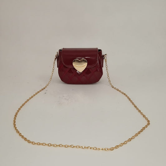 Borsetta lucida con cuore metallico - Rosso