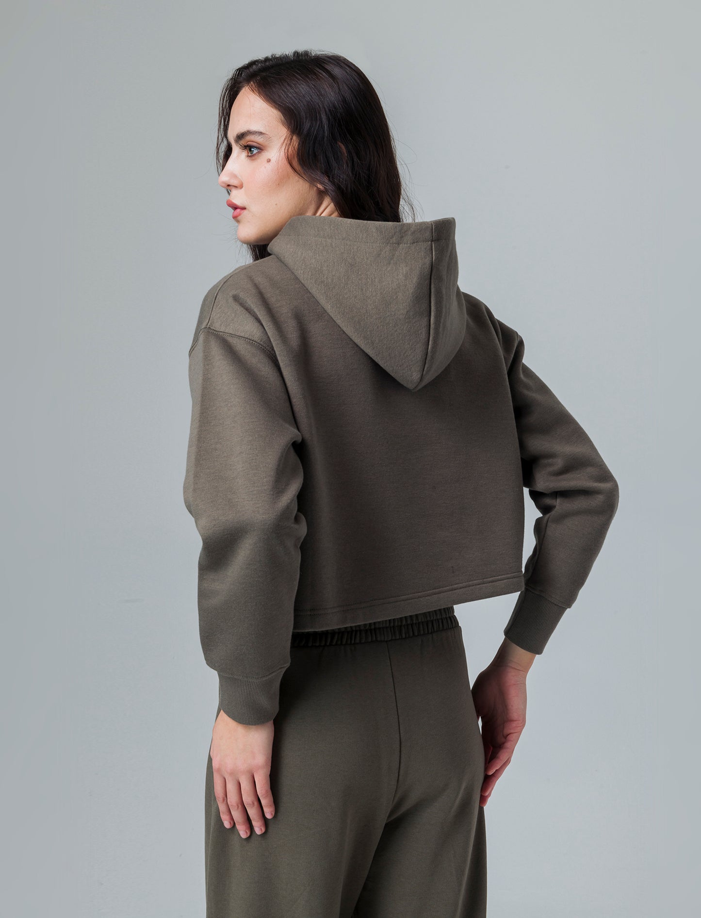 Felpa crop con cappuccio da donna - Verde salvia