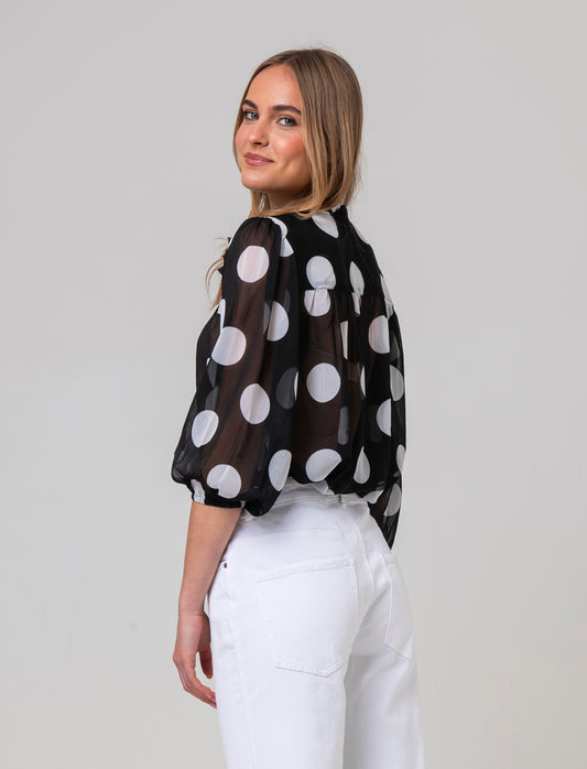 Woman's ruffled blouse for elegant style - 