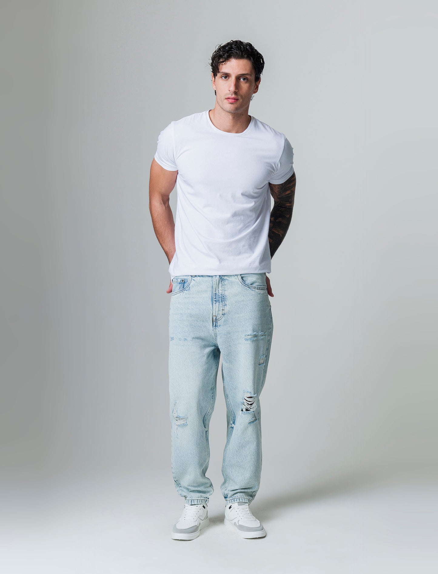 Man's light denim loose fit ripped jeans - Blue