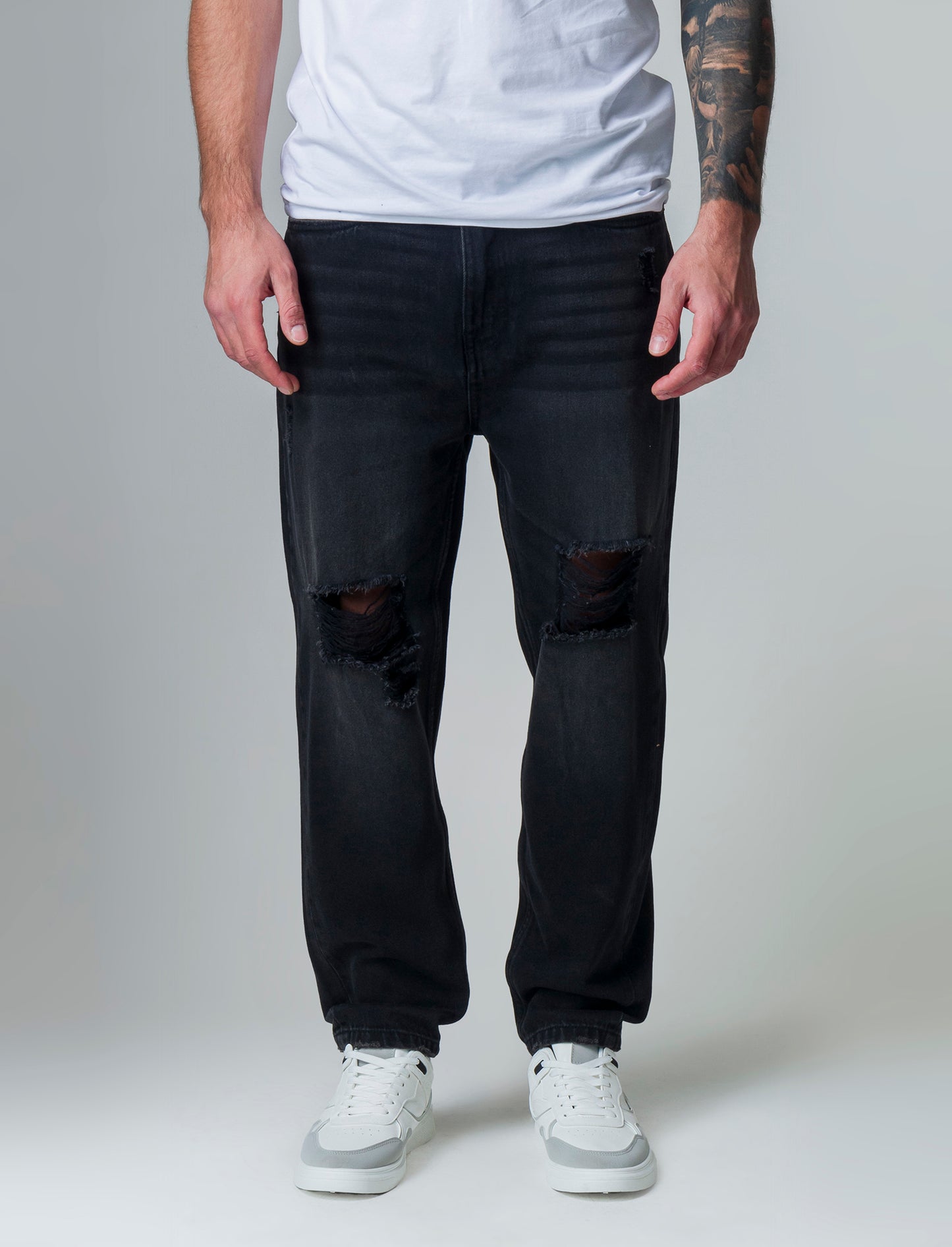 Jeans nero loose fit con strappi da uomo - Nero