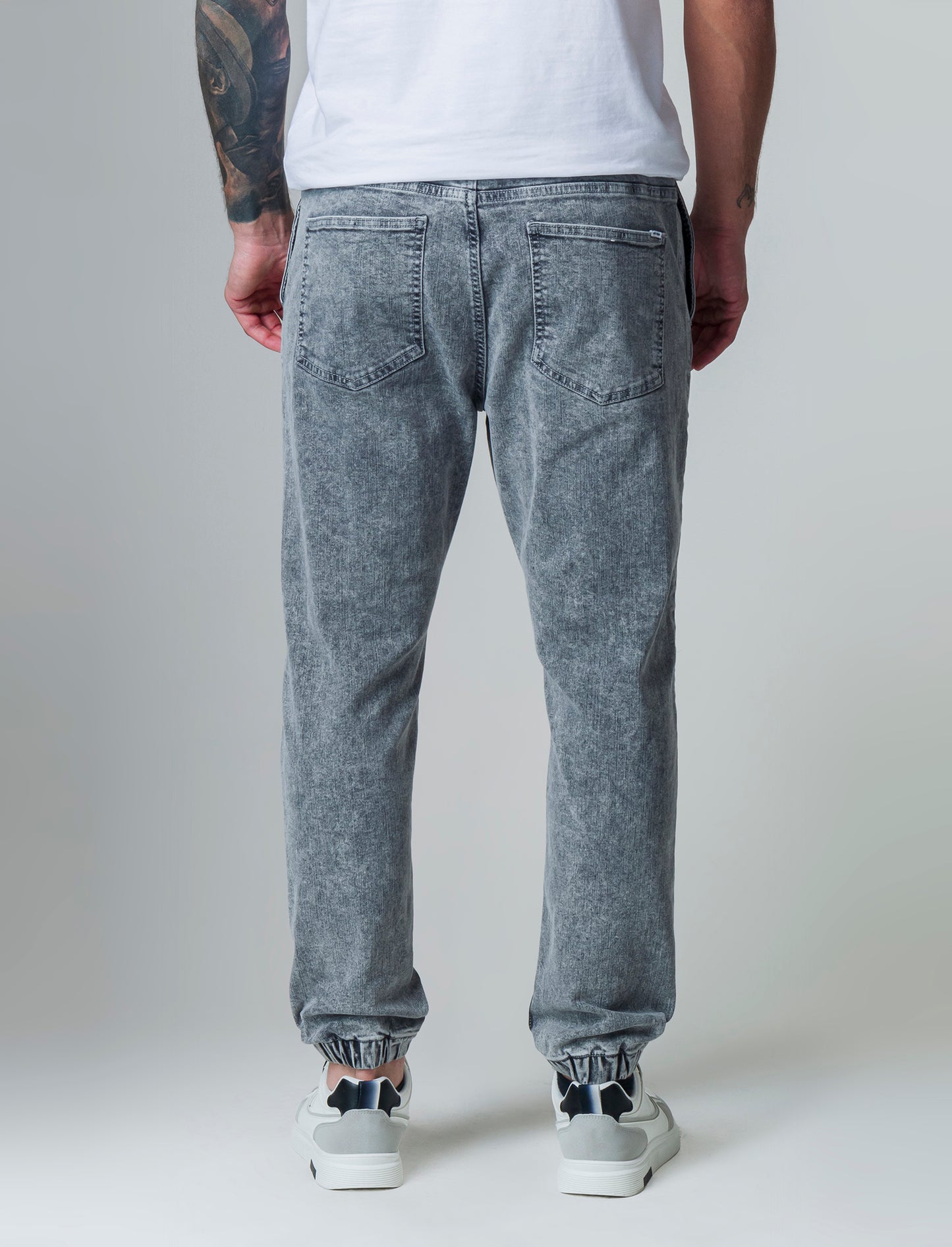 Jeans denim grigio con vita jogger e strappi da uomo - Grigio