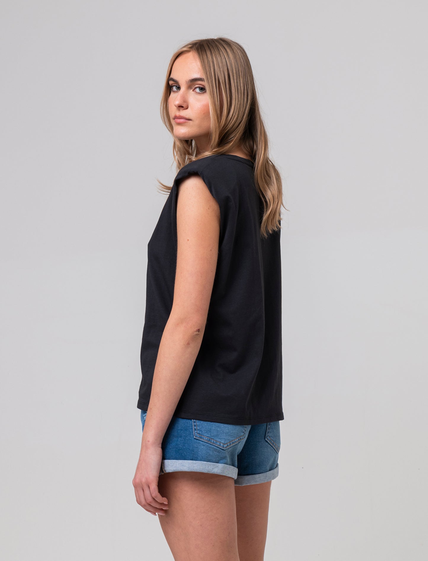 Woman's strappy t-shirt for stylish comfort - Black