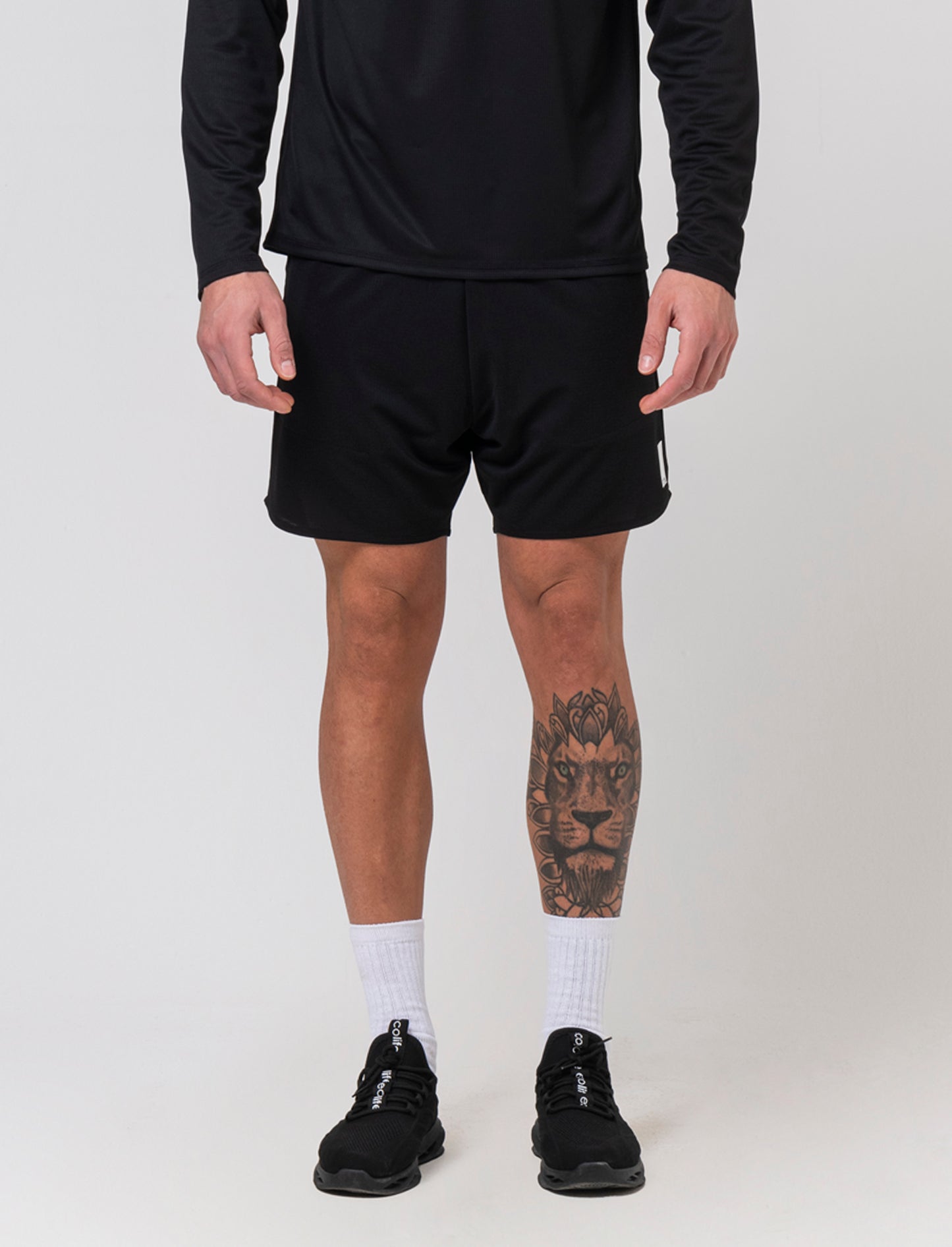 Shorts da allenamento in tessuto tecnico waffle da uomo - Nero