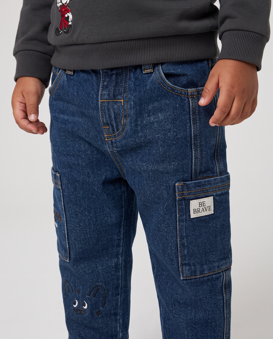 Jeans ampi con ricami e tasconi laterali - Denim