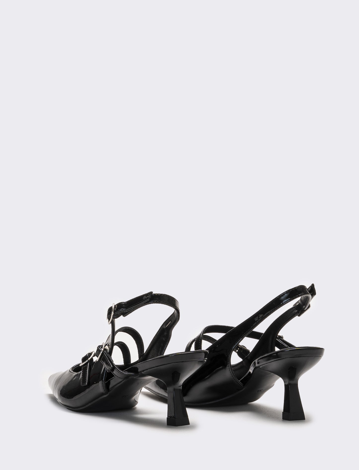 Slingback con fibbie sul davanti - Nero
