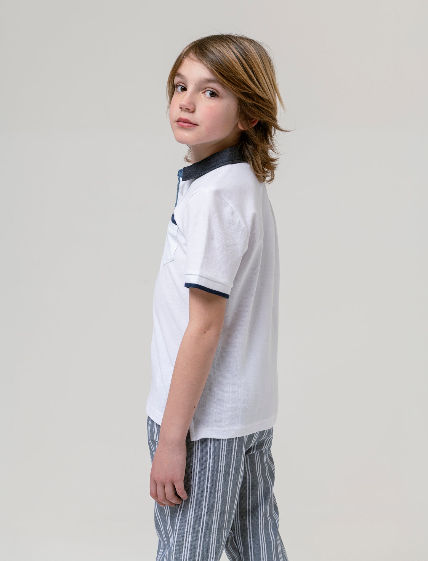 Polo in piquet collo chambray da bambino - Bianco