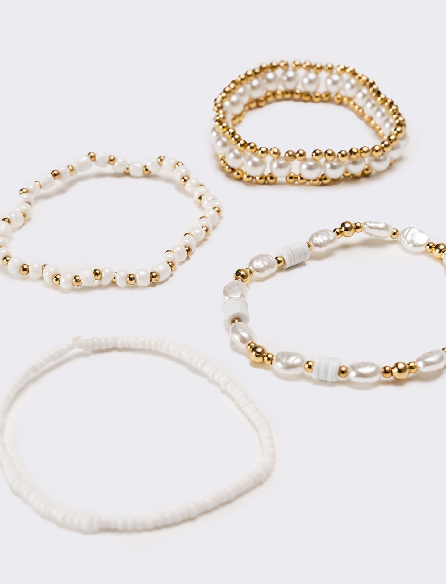 Bracciale donna 4 fili elastici - Oro