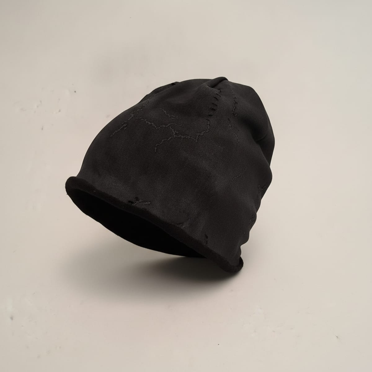 Star-Patterned Melange Beanie - Black