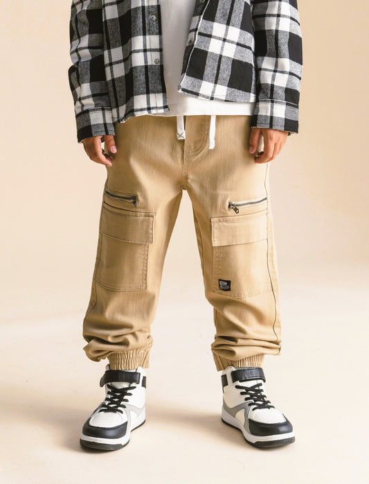 Jogging con tasconi. - Beige