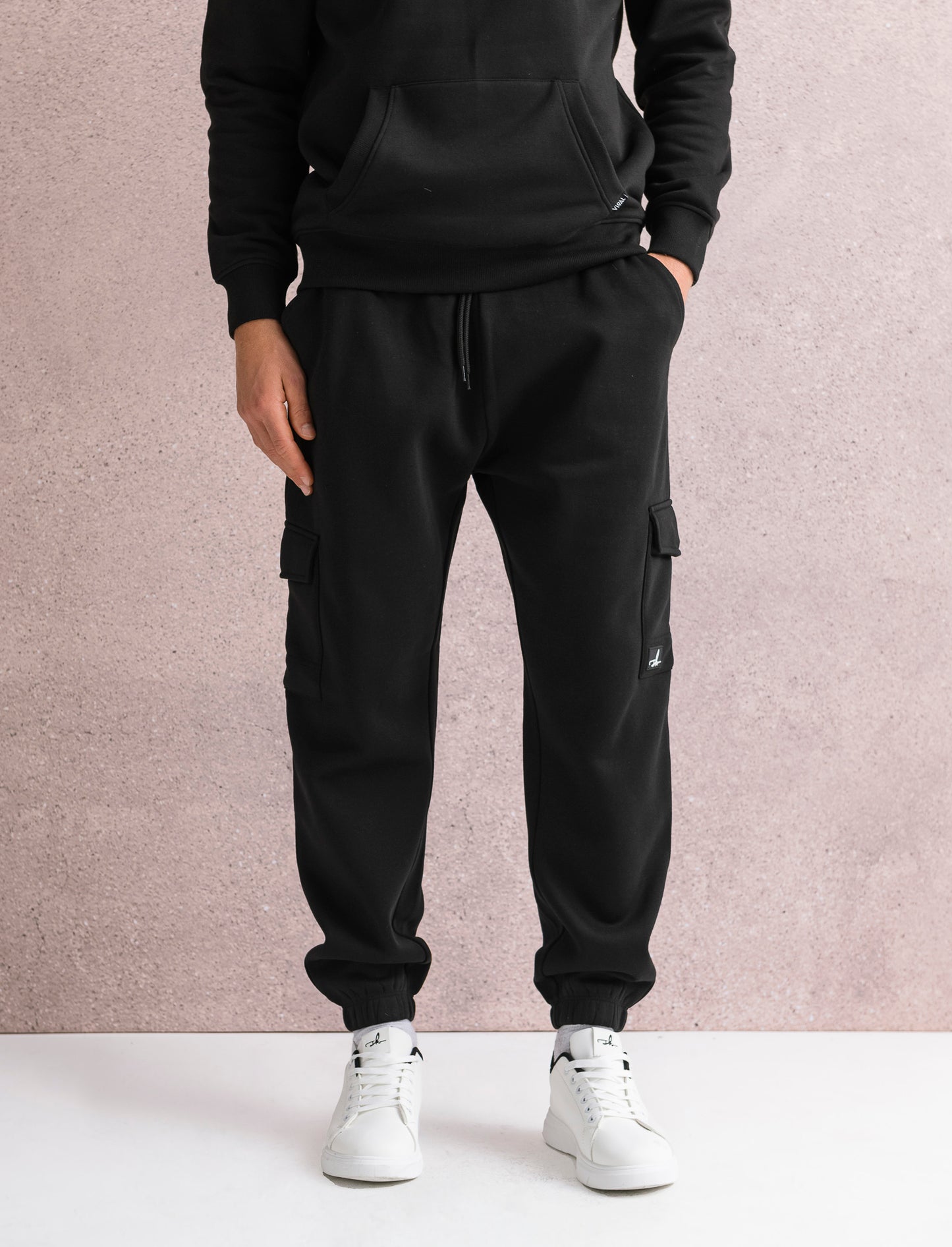 PANTALONI IN FELPA CON TASCONI - Nero