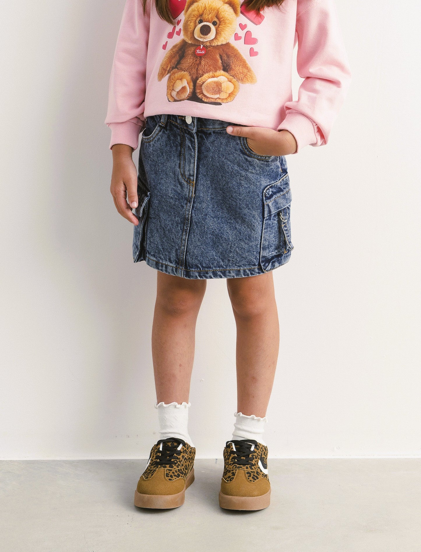 Gonna da bambina in denim con tasconi laterali. - Denim