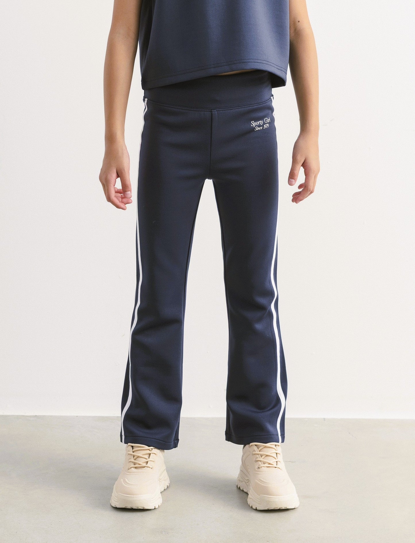 Leggings in tessuto tecnico con profili a contrasto. - Blu