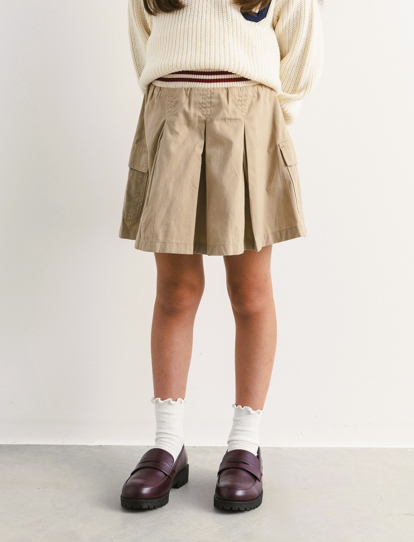 Gonna con piegoni e tasche laterali - Beige