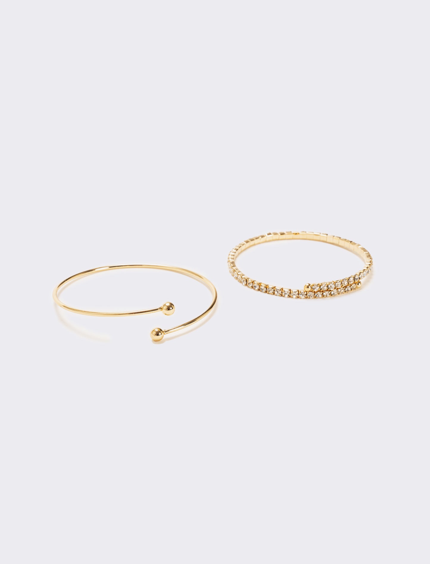 Due bracciali semirigidi con strass - Oro