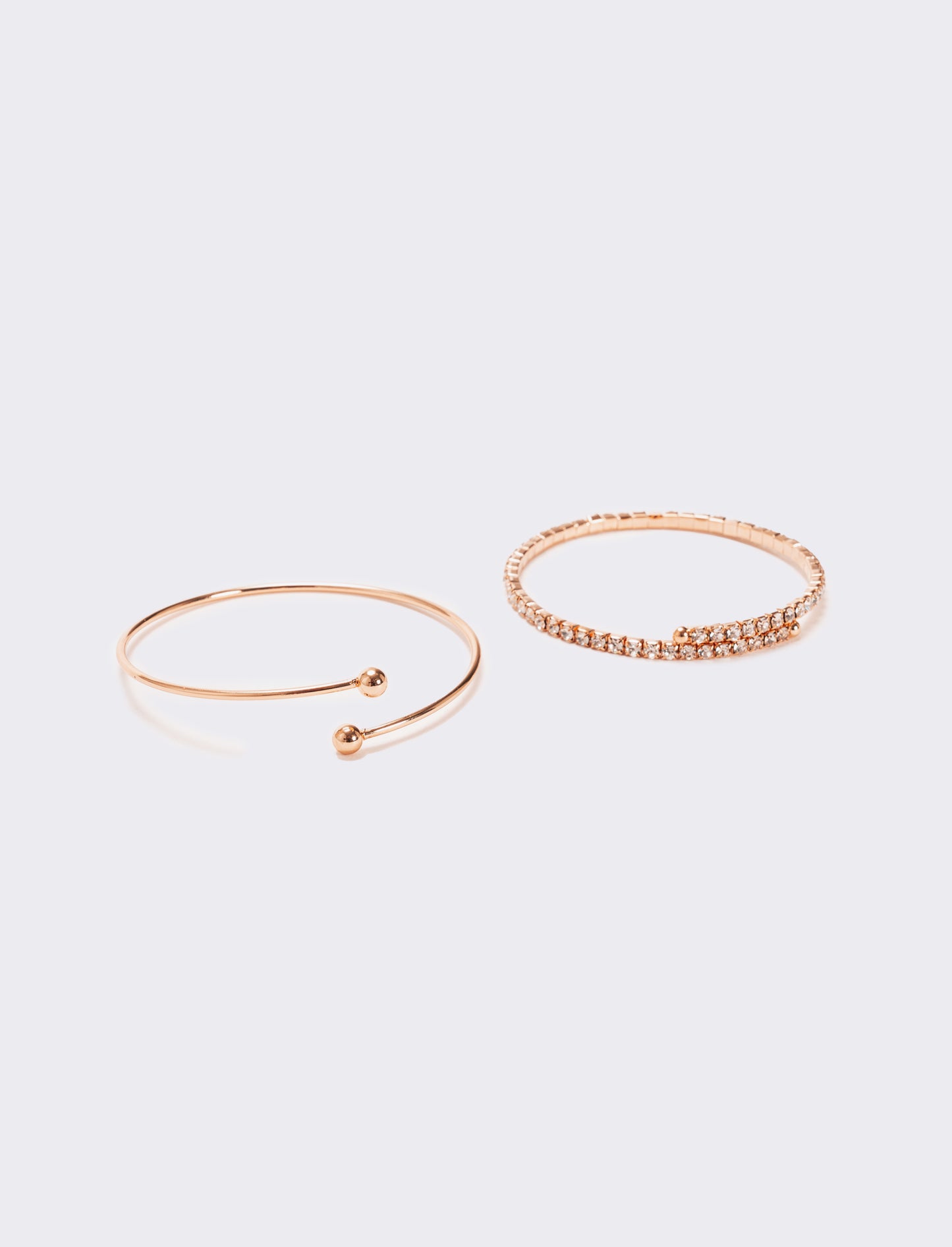Due bracciali semirigidi con strass - Oro rosa