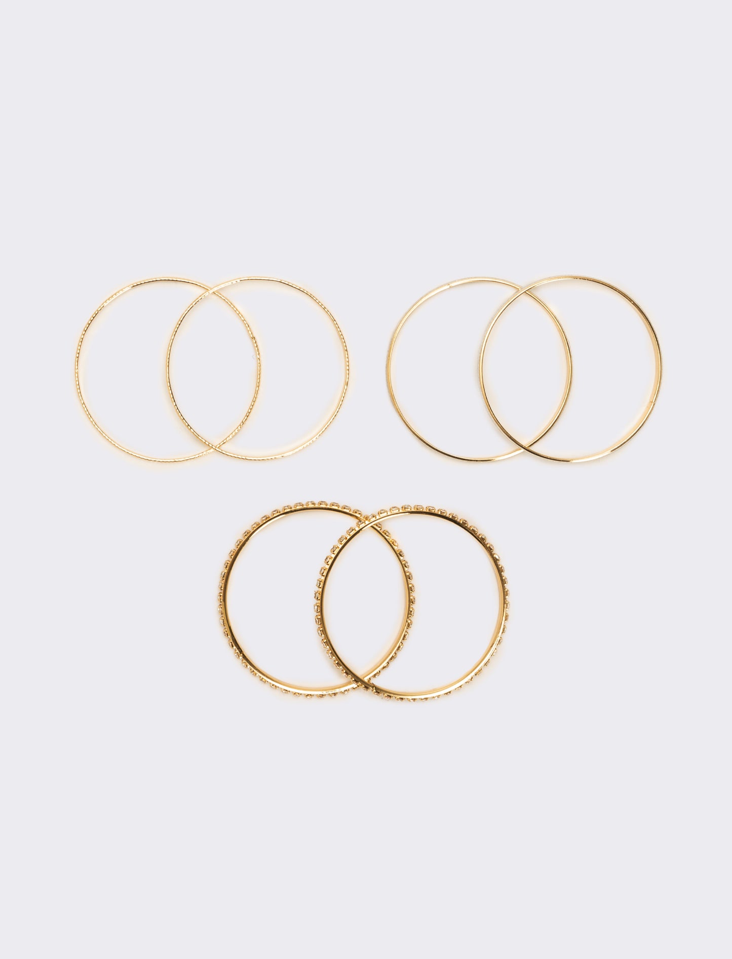 Sei bracciali rigidi con strass - Oro