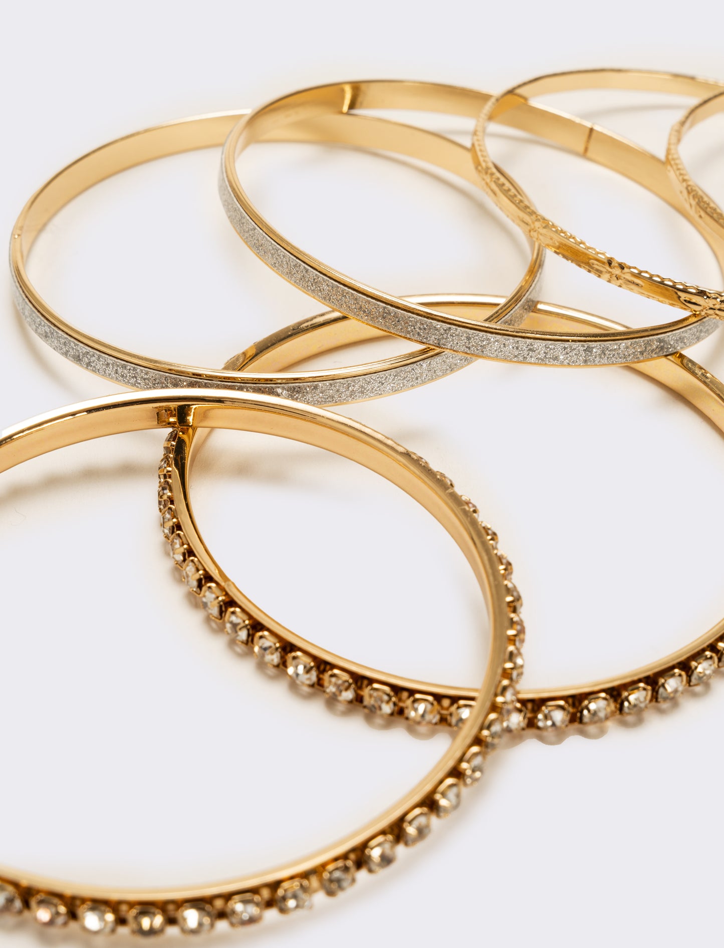 Sei bracciali rigidi con strass - Oro