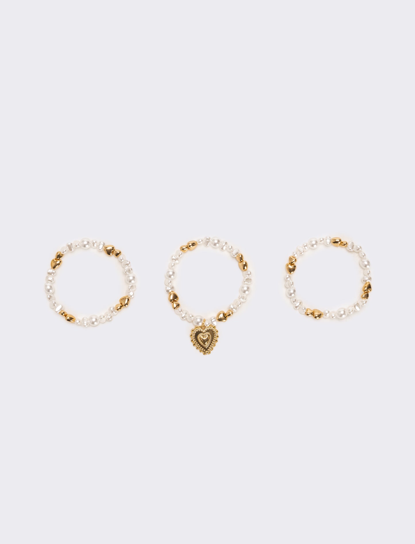 Bracciale tre fili perline elastico - Oro