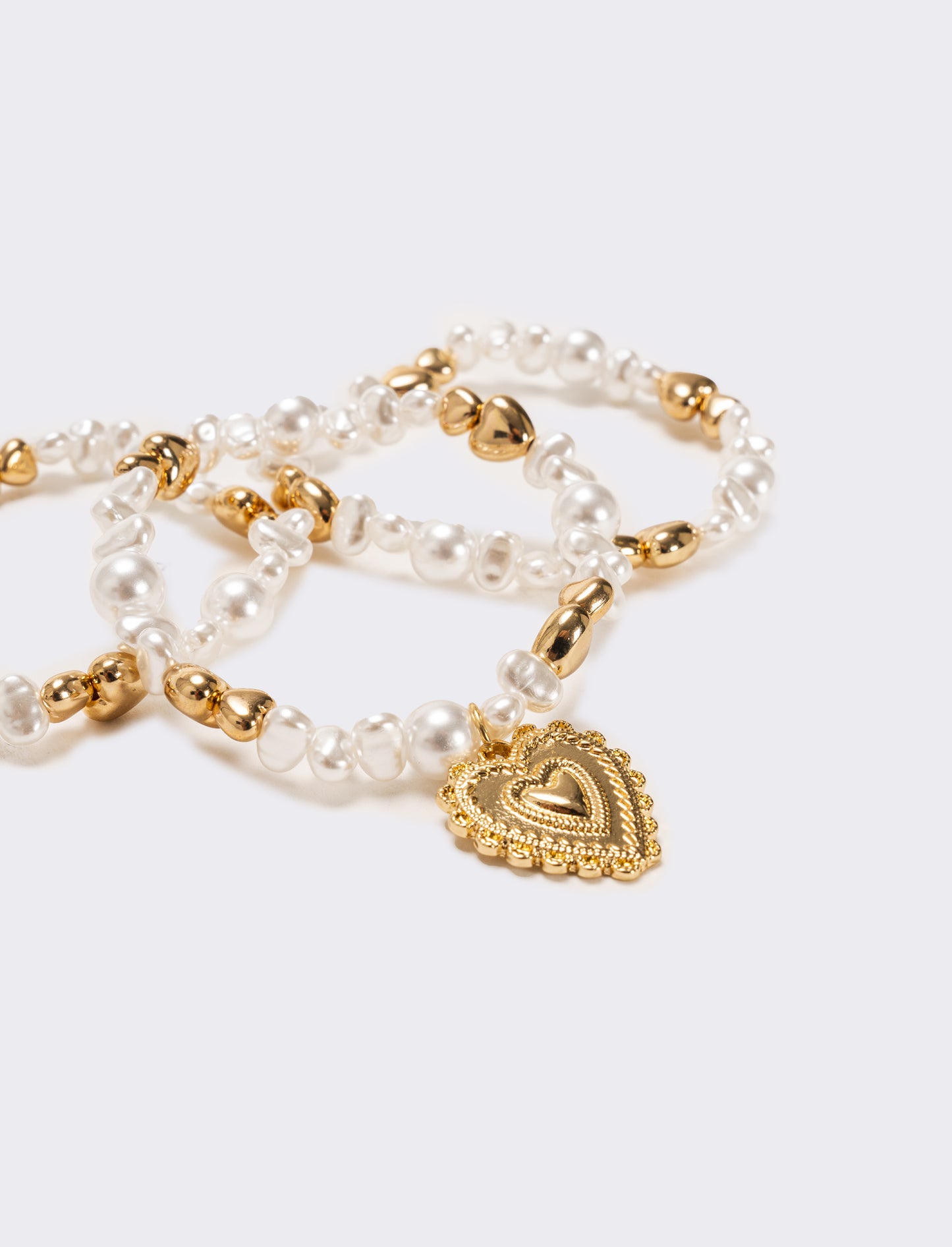Bracciale tre fili perline elastico - Oro