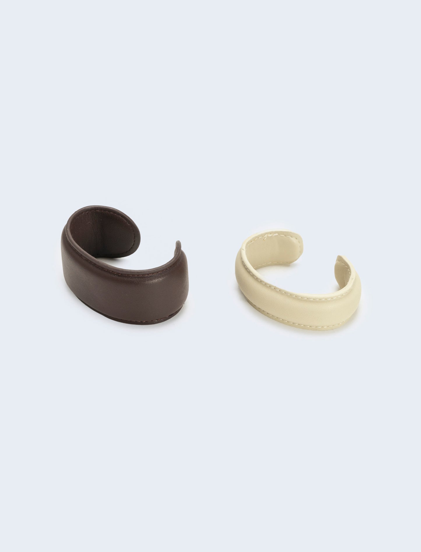 Due bracciali in ecopelle regolabili - Marrone