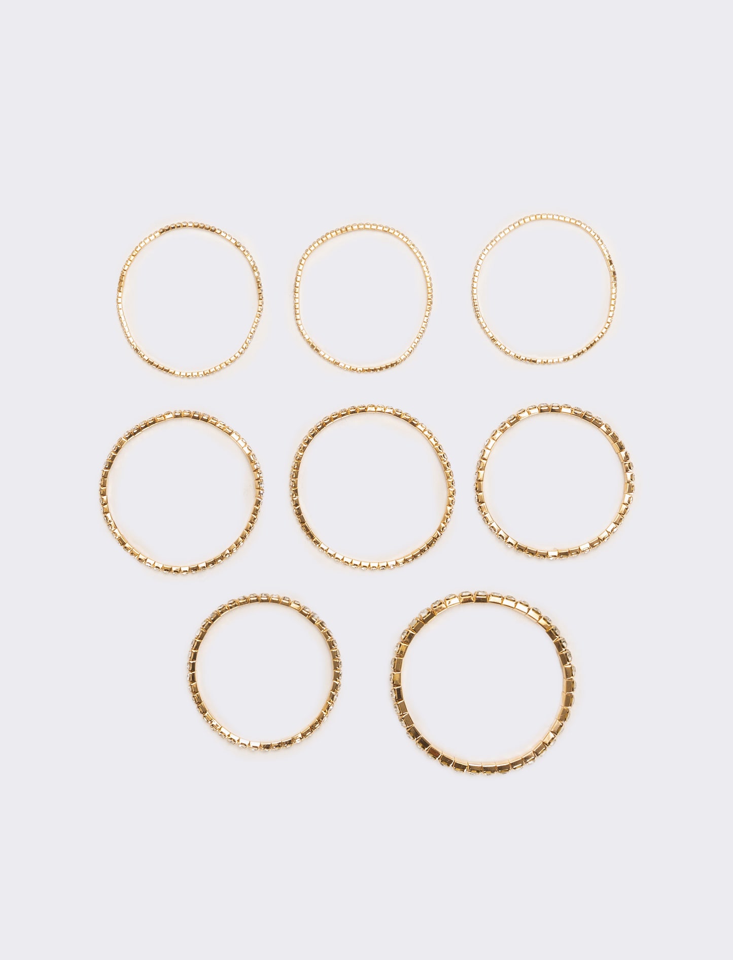 8 bracciali elastici con strass - Oro