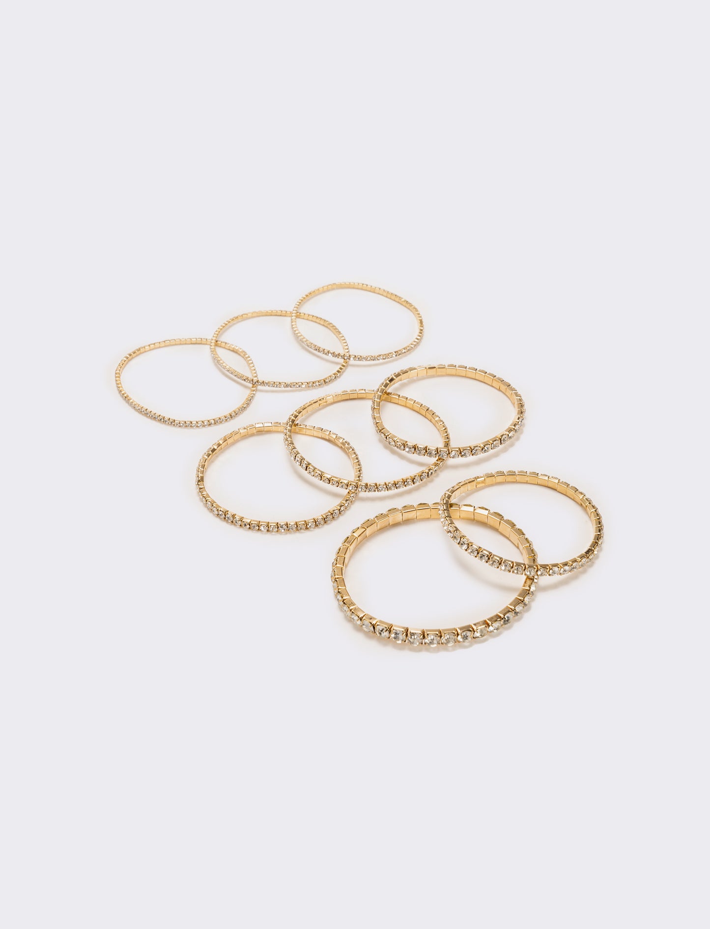 8 bracciali elastici con strass - Oro