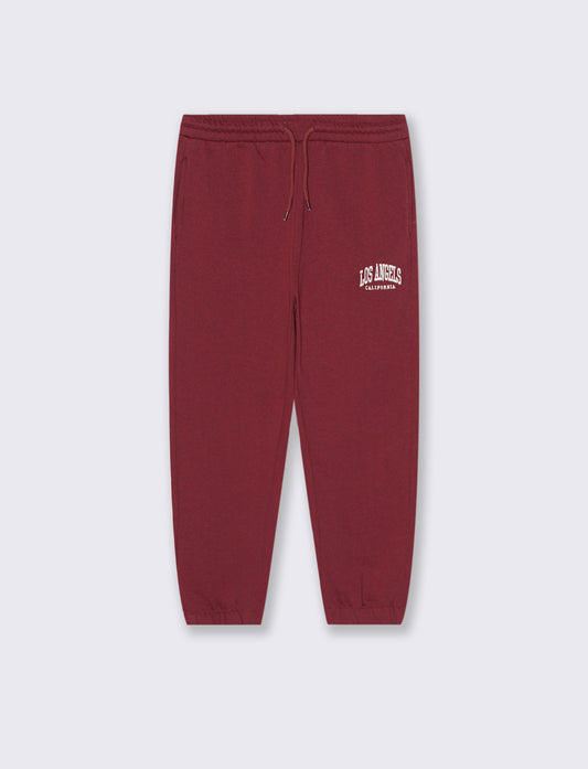 Jogger con ricamo college. - Bordeaux