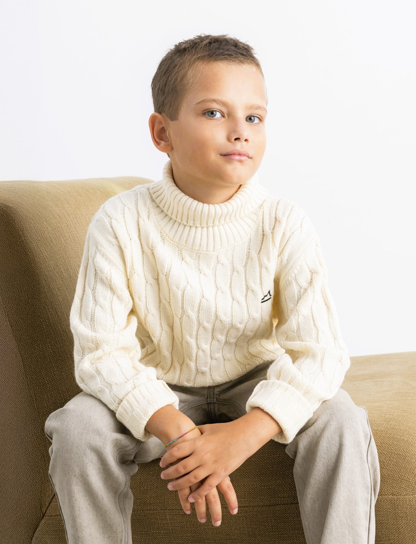 Maglia collo alto  a traccia. - Beige