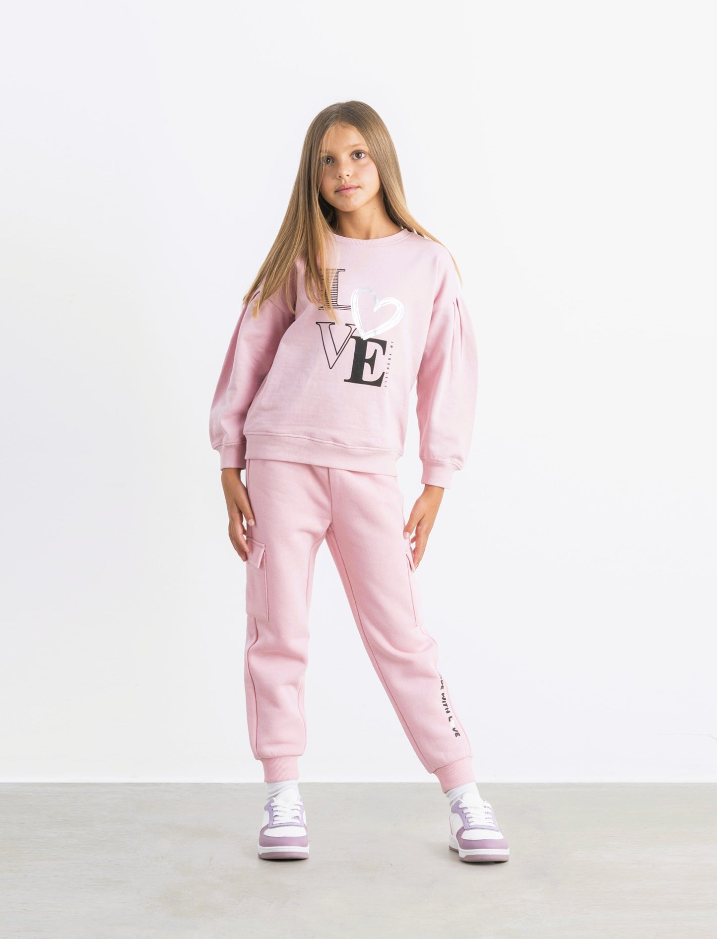 Pantaloni in felpa con tasconi. - Rosa
