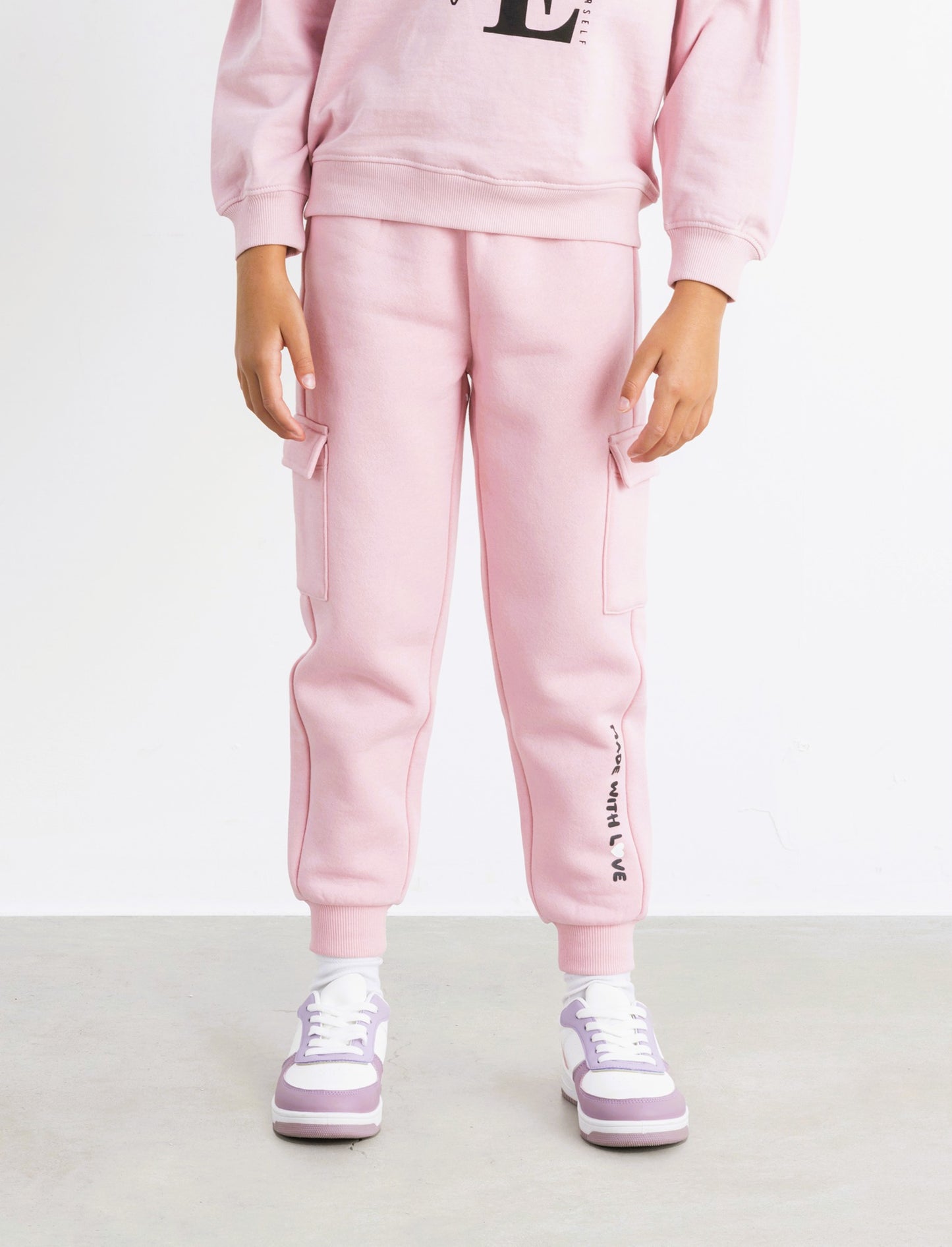 Pantaloni in felpa con tasconi. - Rosa
