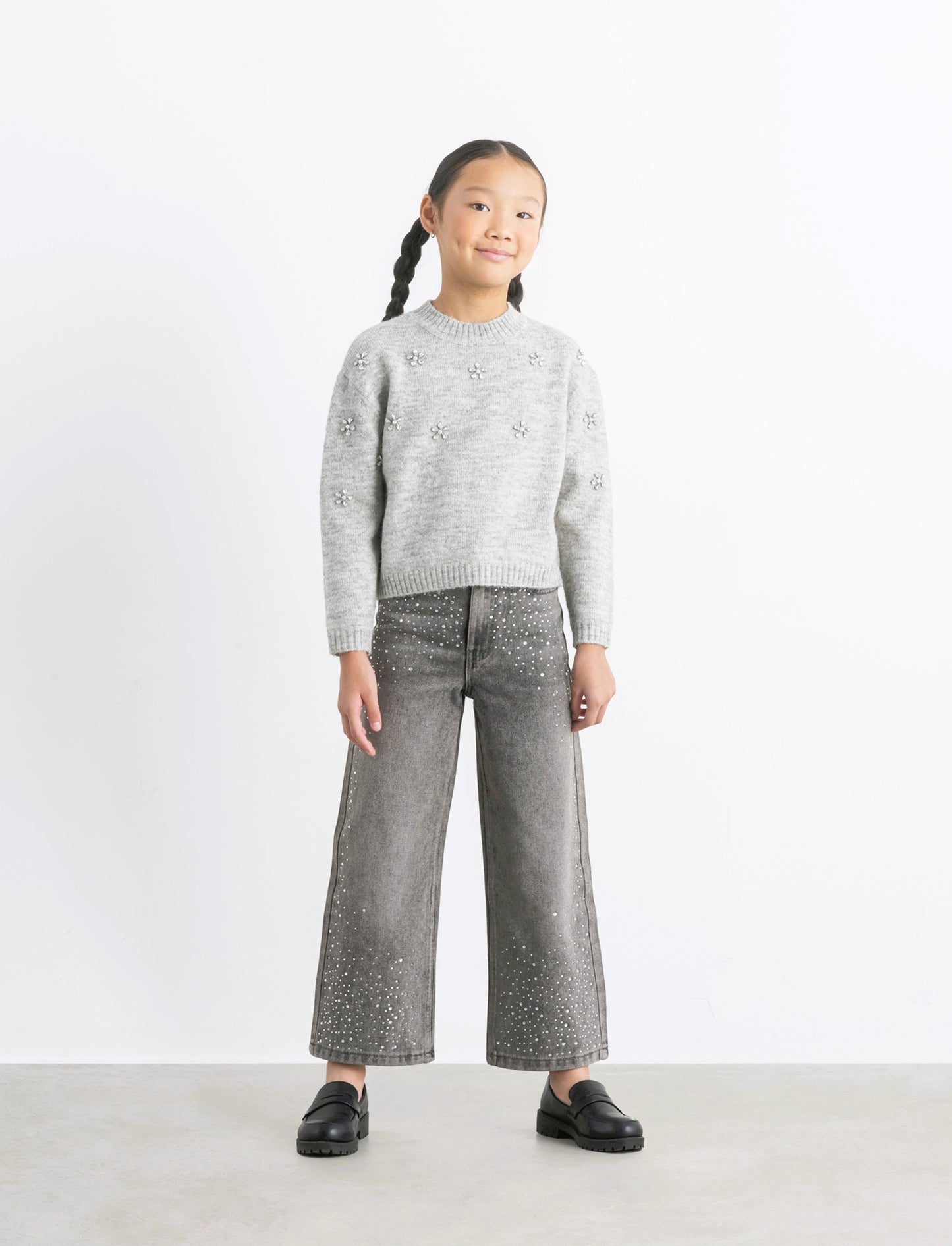Jeans grigio gamba larga con strass. - Grigio