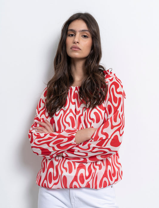 Blusa ampia in tessuto leggero con stampa e fiocco su una spalla. - Rosso