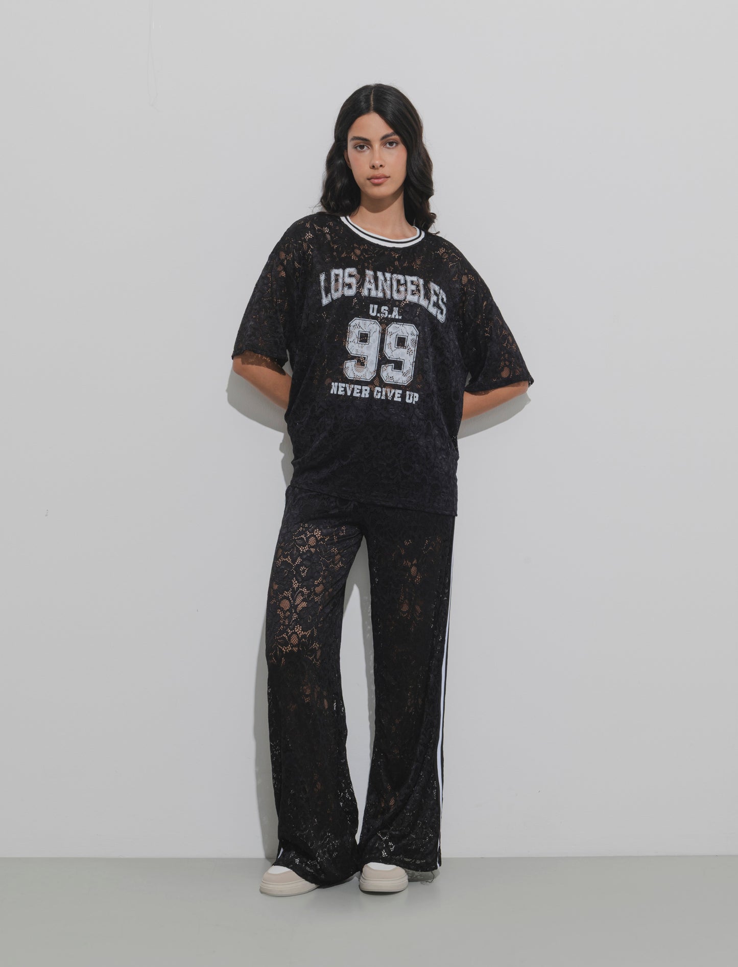 Pantalone in pizzo con bande laterali - Nero