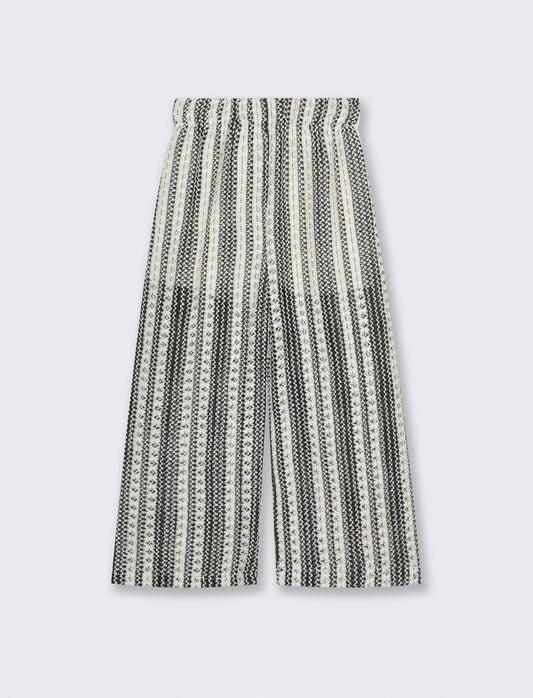 Pantaloni in tessuto a rete traforato. - Fantasia