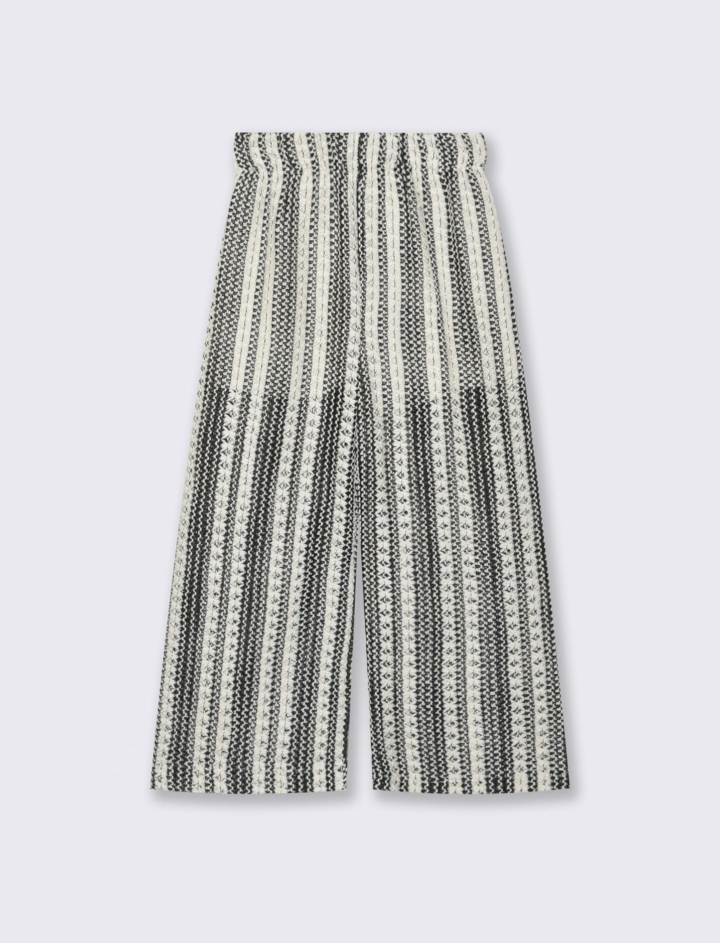 Pantaloni in tessuto a rete traforato. - Fantasia